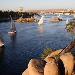 Traditional boats sailing on the Nile river in Aswan, Egypt. You'll find whatever else you need in this lightbox: Egypt