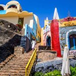 A Nubian man descends on a traditional Nubian style staircase, Aswan Egypt, August 2014