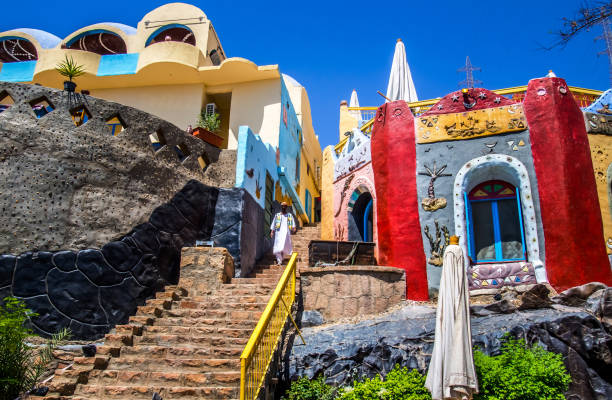 A Nubian man descends on a traditional Nubian style staircase, Aswan Egypt, August 2014