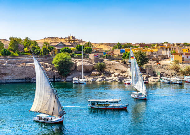 Sunlight over boats on Nile in Aswan, Egypt