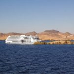 Lake Nasser cruise from Abu Simbel to Aswan, Egypt, with Temple of Kalabsha in the background