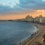 Alexandria, Egypt - November 15, 2018 :
On the edge of the mediterranean sea, we find the corniche of alexandria. It is one of the main traffic corridors in the city and a wonderful walk especially at sunset. There are many hotels, restaurants and cafes along the corniche, This cosmopolitan city has unequivocally a mythical aura.