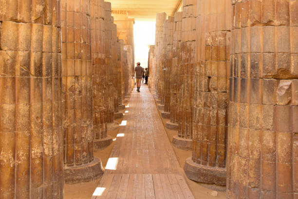 entrance to the ancient necropolis and pyramids complex in sakkara, egypt at sunny day