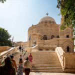 Cairo, Egypt - October 8, 2023: Tourists in front of the coptic orthodox church of St. George in Cairo city. Egypt, north Africa.